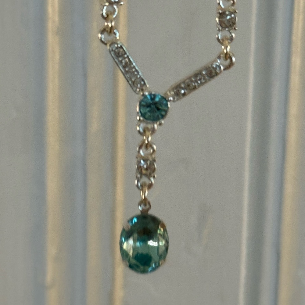 2 blue costume jewelry necklaces- one aquamarine & one royal blue.